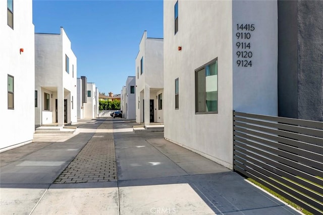 9124 N Nilo Ln, Panorama City, CA 91402 - view of concrete road featuring a residential view