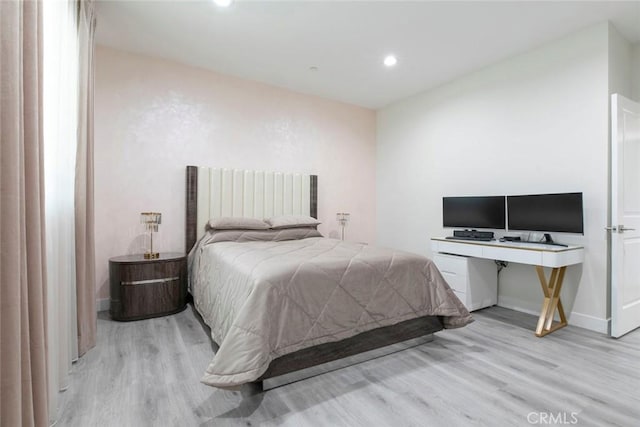9124 N Nilo Ln, Panorama City, CA 91402 - bedroom featuring wood finished floors and recessed lighting