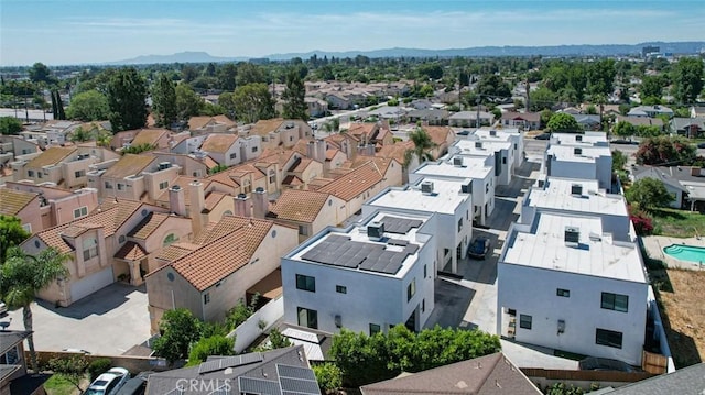 9124 N Nilo Ln, Panorama City, CA 91402 - aerial perspective of suburban area with a mountain backdrop