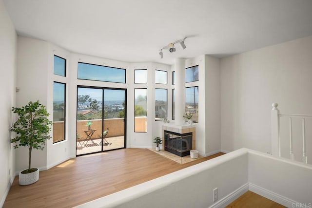3531 Columbia St, San Diego, CA 92103 - interior space with wood finished floors and a tiled fireplace