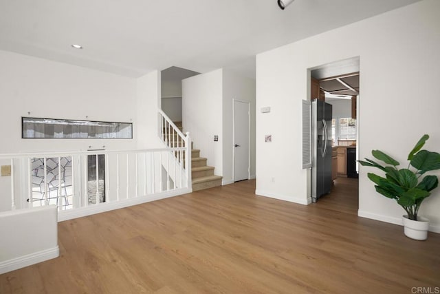 3531 Columbia St, San Diego, CA 92103 - unfurnished living room featuring wood finished floors and stairway