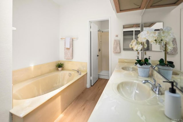 3531 Columbia St, San Diego, CA 92103 - full bath featuring wood finished floors, a bath, a shower stall, and double vanity
