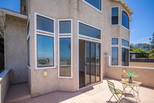3531 Columbia St, San Diego, CA 92103 - back of house featuring stucco siding and a patio