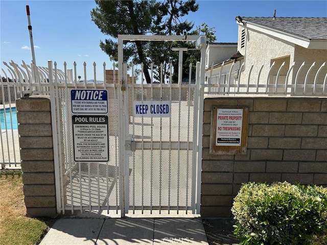 25879 Baylor Way, Hemet, CA 92544 - view of property's community featuring a gate