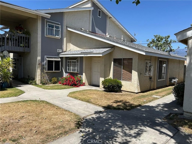 25879 Baylor Way, Hemet, CA 92544 - view of front facade featuring stucco siding and a balcony