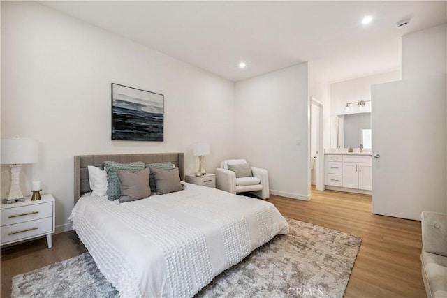 11722 Avon Way Unit 103, Los Angeles, CA 90066 - bedroom with light wood finished floors, recessed lighting, and ensuite bathroom