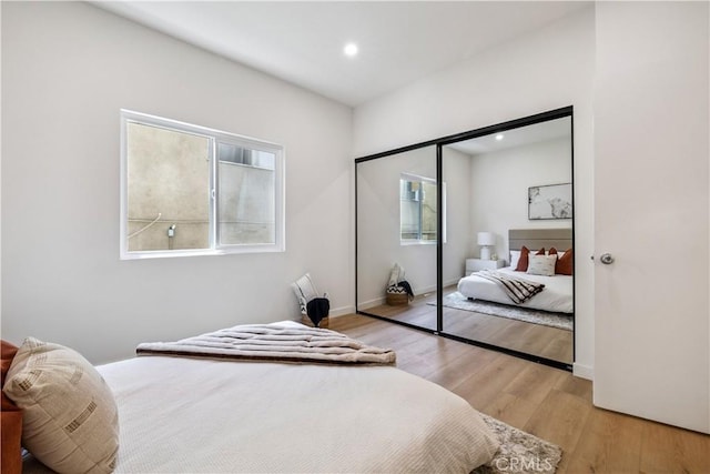 11722 Avon Way Unit 103, Los Angeles, CA 90066 - bedroom with light wood-style flooring, recessed lighting, and a closet