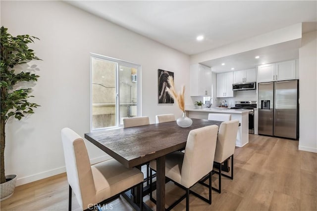 11722 Avon Way Unit 103, Los Angeles, CA 90066 - dining room with light wood-style floors and recessed lighting