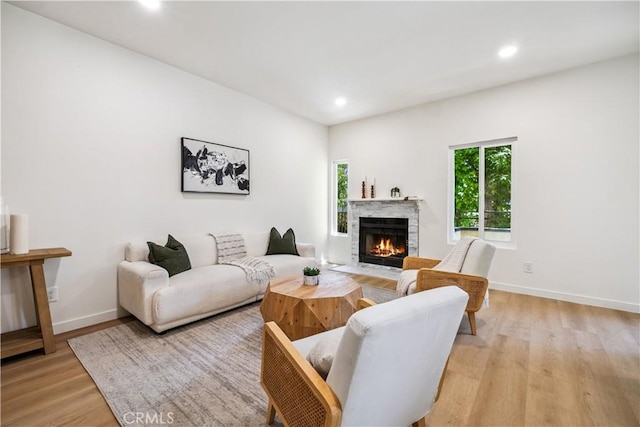 11722 Avon Way Unit 103, Los Angeles, CA 90066 - living area with light wood-type flooring, recessed lighting, and a fireplace