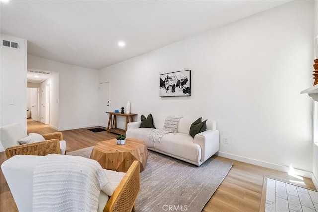 11722 Avon Way Unit 103, Los Angeles, CA 90066 - living room with light wood-style floors and recessed lighting