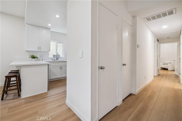 11722 Avon Way Unit 103, Los Angeles, CA 90066 - corridor featuring light wood-style floors and recessed lighting
