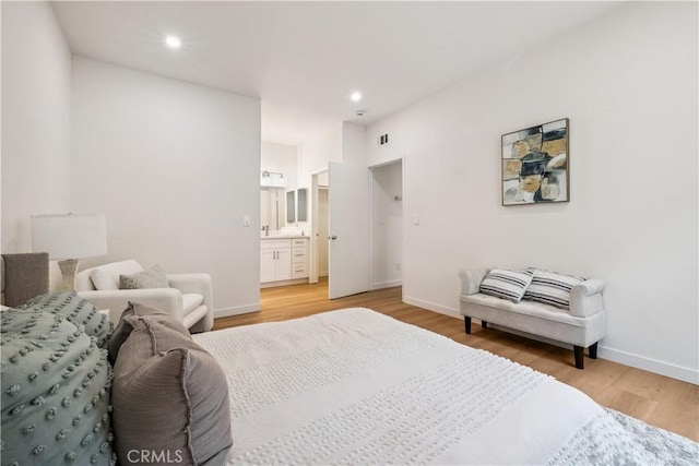 11722 Avon Way Unit 103, Los Angeles, CA 90066 - bedroom with light wood-style floors, recessed lighting, and ensuite bath