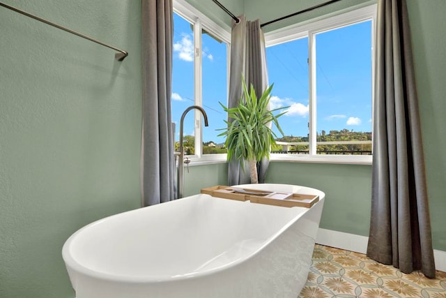 4710 Sleeping Indian Rd, Fallbrook, CA 92028 - full bath with a soaking tub, a textured wall, and tile patterned flooring