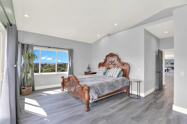 4710 Sleeping Indian Rd, Fallbrook, CA 92028 - bedroom with wood finished floors, vaulted ceiling, and recessed lighting