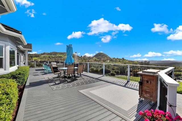 4710 Sleeping Indian Rd, Fallbrook, CA 92028 - wooden deck featuring a mountain view and outdoor dining area