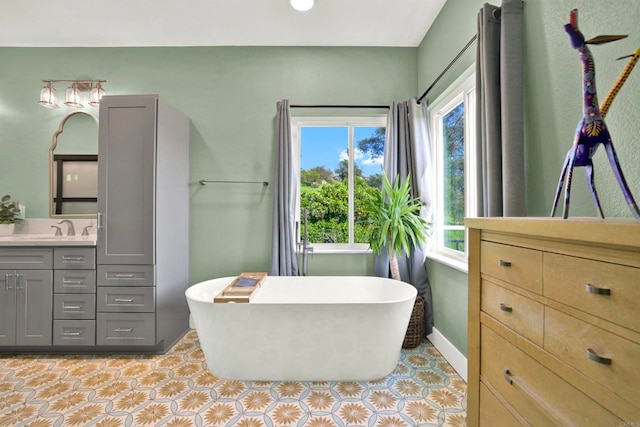 4710 Sleeping Indian Rd, Fallbrook, CA 92028 - bathroom featuring vanity, plenty of natural light, a freestanding bath, and tile patterned floors