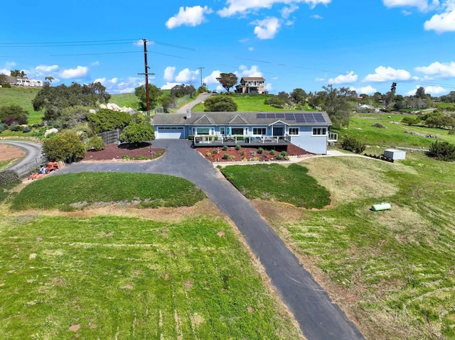 4710 Sleeping Indian Rd, Fallbrook, CA 92028 - view of front of house with a front lawn, an attached garage, and asphalt driveway