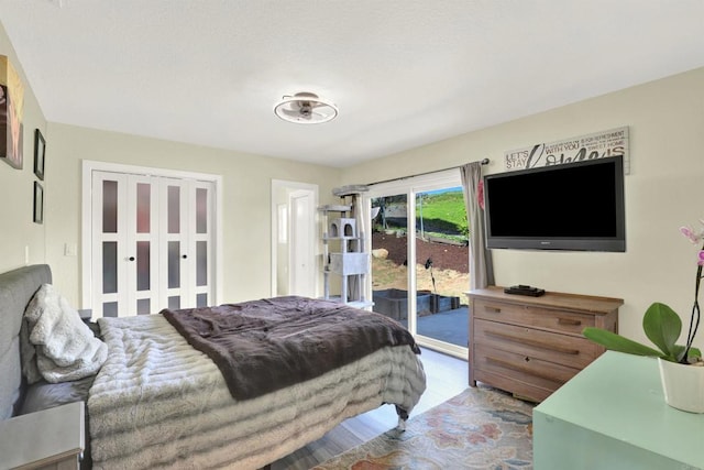 4710 Sleeping Indian Rd, Fallbrook, CA 92028 - bedroom with access to outside and wood finished floors
