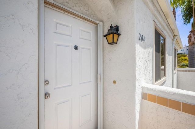 13292 Salmon River Rd Unit 204, San Diego, CA 92129 - entrance to property featuring stucco siding