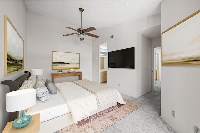 13292 Salmon River Rd Unit 204, San Diego, CA 92129 - carpeted bedroom featuring lofted ceiling, a textured ceiling, ensuite bathroom, and a ceiling fan