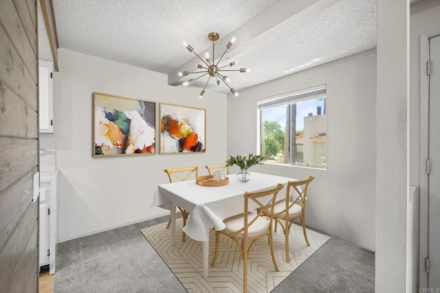 13292 Salmon River Rd Unit 204, San Diego, CA 92129 - dining area with a textured ceiling, a chandelier, and light carpet