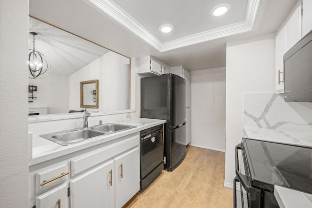 13292 Salmon River Rd Unit 204, San Diego, CA 92129 - kitchen featuring black appliances, light countertops, white cabinets, ornamental molding, and light wood-style floors