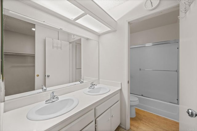 13292 Salmon River Rd Unit 204, San Diego, CA 92129 - full bath with double vanity and shower / bath combination with glass door