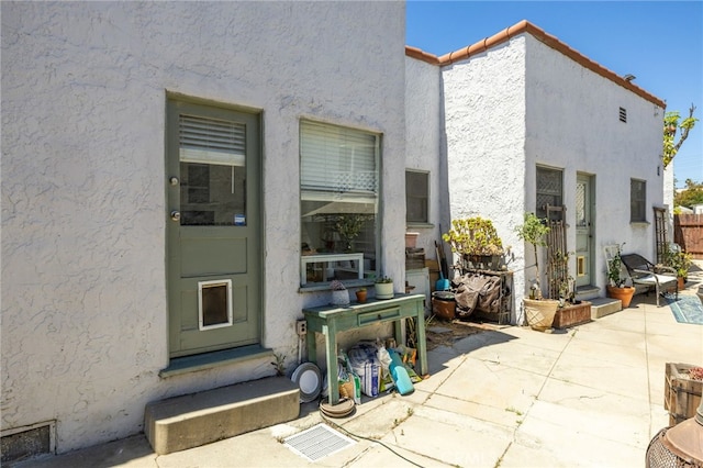1928 Rosalia Rd, Los Angeles, CA 90027 - property entrance featuring stucco siding and a patio area