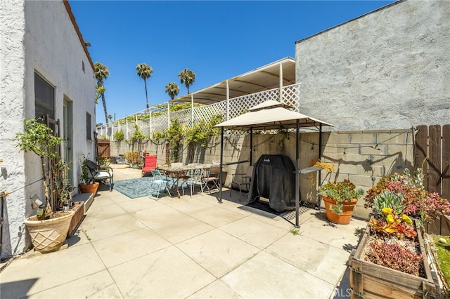 1928 Rosalia Rd, Los Angeles, CA 90027 - fenced backyard with a gazebo, a patio, and a grill