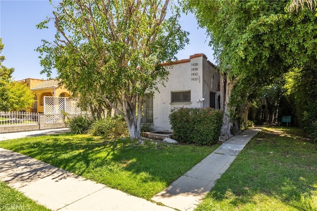 1928 Rosalia Rd, Los Angeles, CA 90027 - mediterranean / spanish house with stucco siding