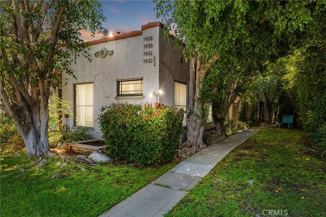 1928 Rosalia Rd, Los Angeles, CA 90027 - mediterranean / spanish home with stucco siding and a front yard
