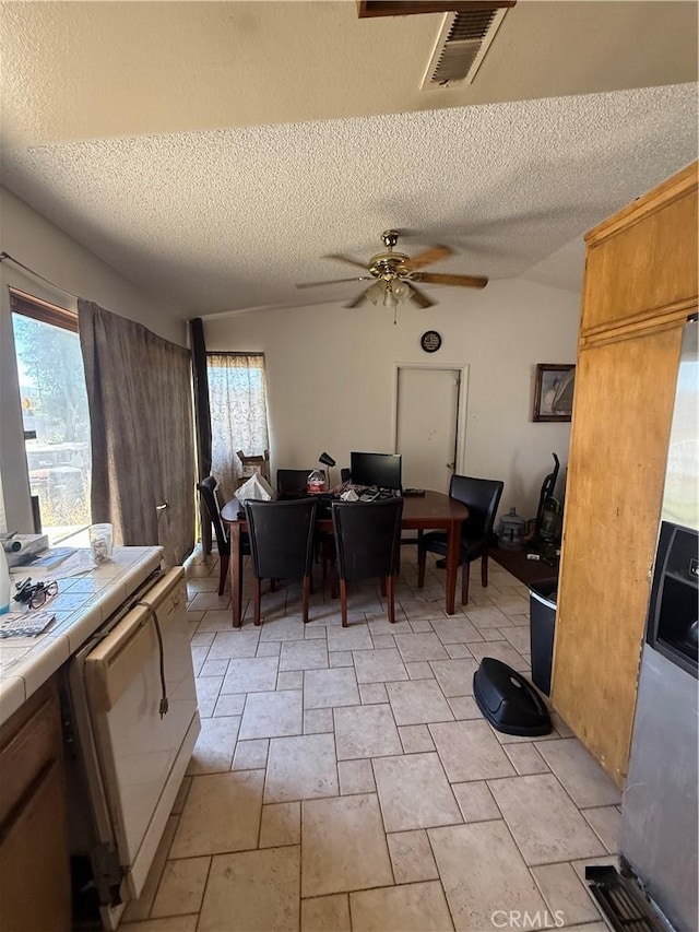 12490 Wolverine Cir, Moreno Valley, CA 92555 - dining area with a textured ceiling and ceiling fan