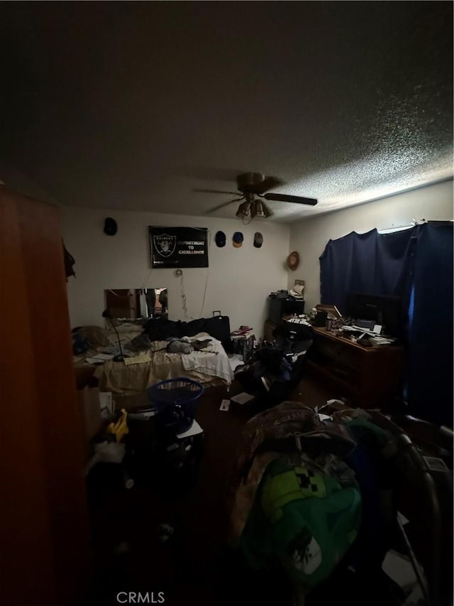 12490 Wolverine Cir, Moreno Valley, CA 92555 - bedroom with ceiling fan and a textured ceiling