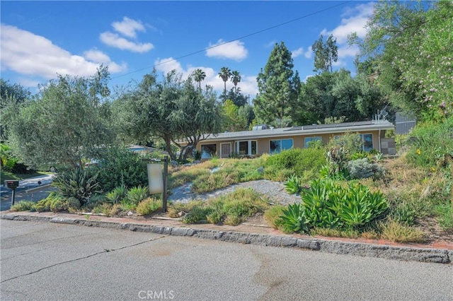 3777 N Arrowhead Ave, San Bernardino, CA 92405 - view of front of house with roof mounted solar panels