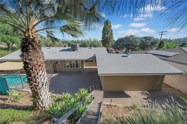 3777 N Arrowhead Ave, San Bernardino, CA 92405 - view of property exterior with a patio and a central air condition unit