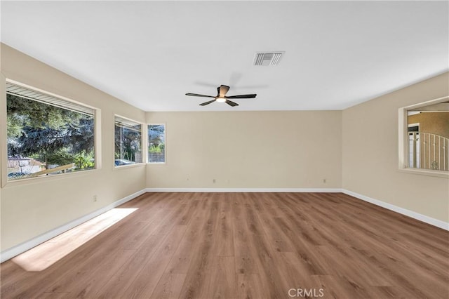 3777 N Arrowhead Ave, San Bernardino, CA 92405 - empty room featuring light wood-style flooring and ceiling fan