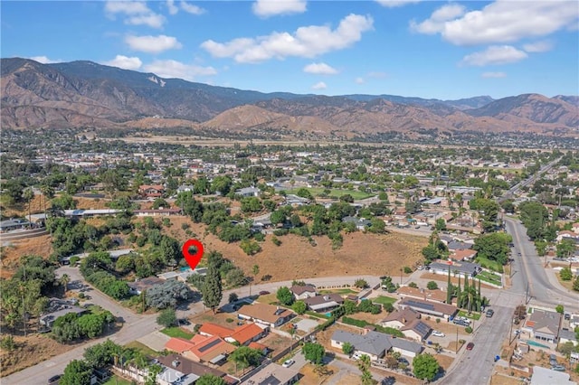 3777 N Arrowhead Ave, San Bernardino, CA 92405 - aerial view of property's location featuring a mountain backdrop and nearby suburban area