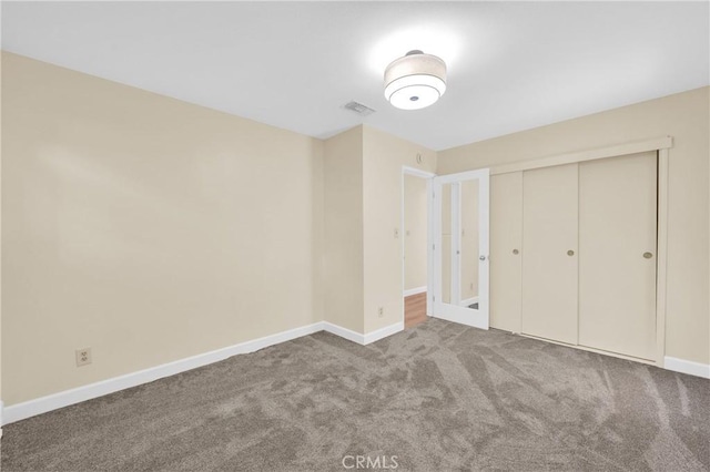 3777 N Arrowhead Ave, San Bernardino, CA 92405 - unfurnished bedroom featuring carpet and a closet