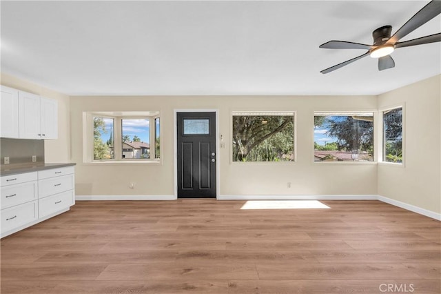3777 N Arrowhead Ave, San Bernardino, CA 92405 - foyer featuring healthy amount of natural light, light wood-style floors, and a ceiling fan