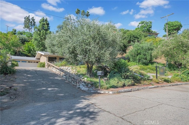3777 N Arrowhead Ave, San Bernardino, CA 92405 - view of front of house featuring a garage and driveway