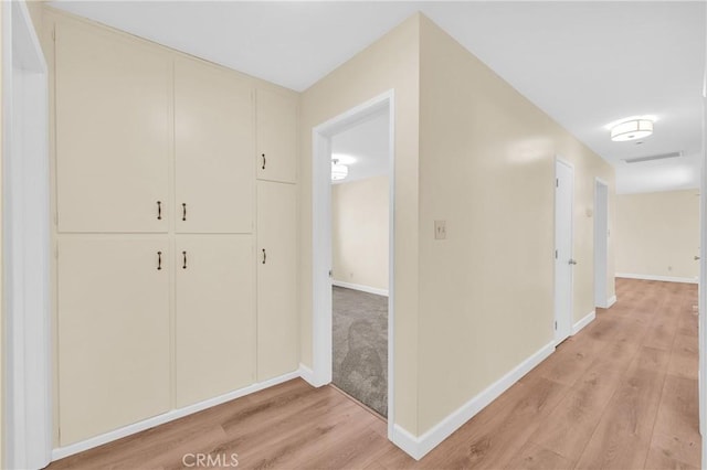 3777 N Arrowhead Ave, San Bernardino, CA 92405 - hall with light wood-type flooring and baseboards