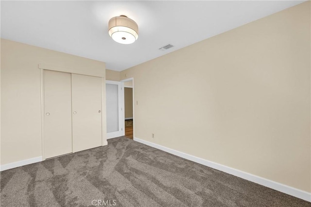 3777 N Arrowhead Ave, San Bernardino, CA 92405 - unfurnished bedroom featuring carpet floors and a closet