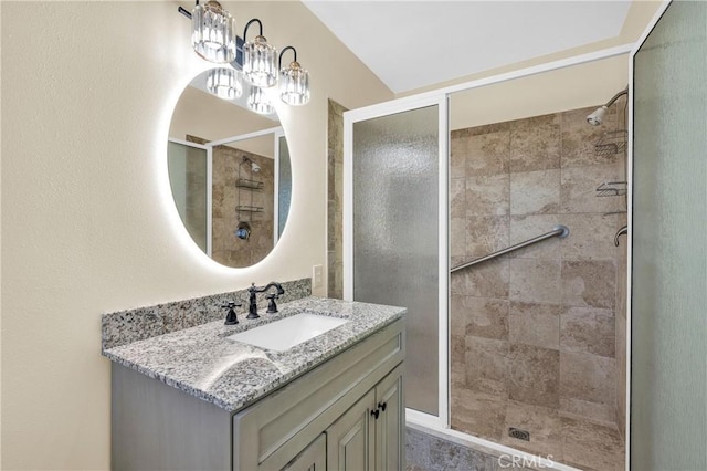 3777 N Arrowhead Ave, San Bernardino, CA 92405 - bathroom featuring a shower stall, vanity, and a chandelier