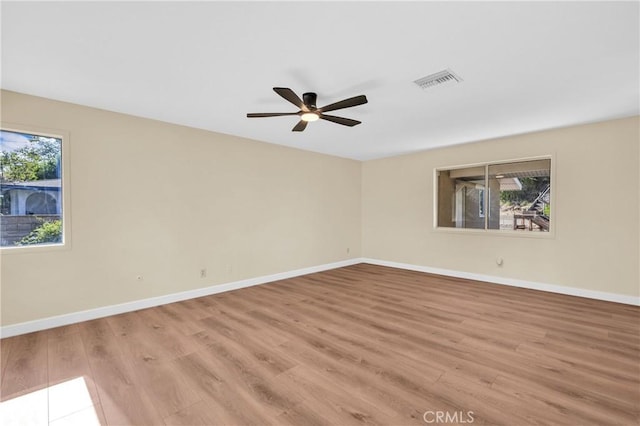 3777 N Arrowhead Ave, San Bernardino, CA 92405 - unfurnished room with a ceiling fan and light wood-style floors