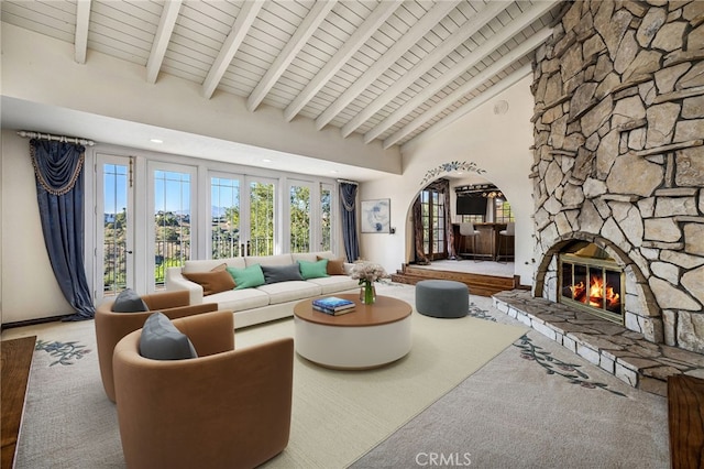 23511 Mirage Ln, Diamond Bar, CA 91765 - living room with a stone fireplace, high vaulted ceiling, arched walkways, and a wood ceiling with exposed beams
