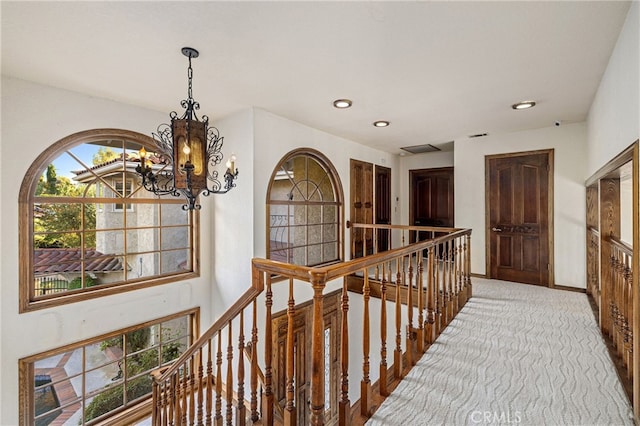 23511 Mirage Ln, Diamond Bar, CA 91765 - corridor featuring an upstairs landing, a chandelier, light carpet, and recessed lighting