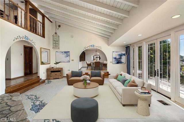 23511 Mirage Ln, Diamond Bar, CA 91765 - living room featuring arched walkways, french doors, beam ceiling, recessed lighting, and a chandelier
