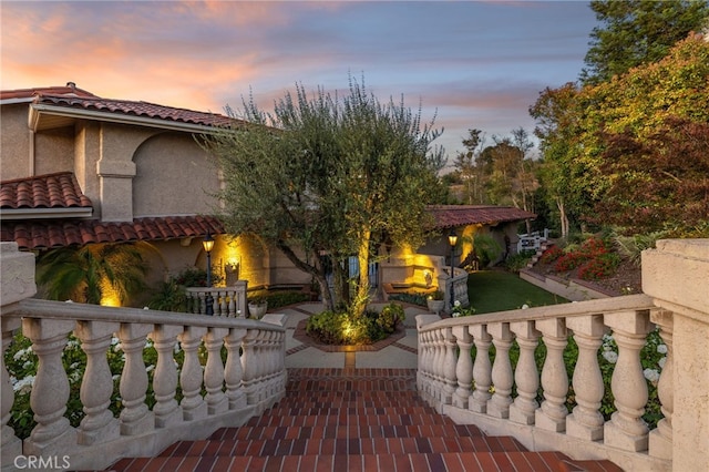 23511 Mirage Ln, Diamond Bar, CA 91765 - mediterranean / spanish-style house featuring a tiled roof, a patio area, and stucco siding
