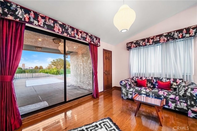 2008 S Bentley Ave Unit 5, Los Angeles, CA 90025 - living area with vaulted ceiling and hardwood / wood-style flooring