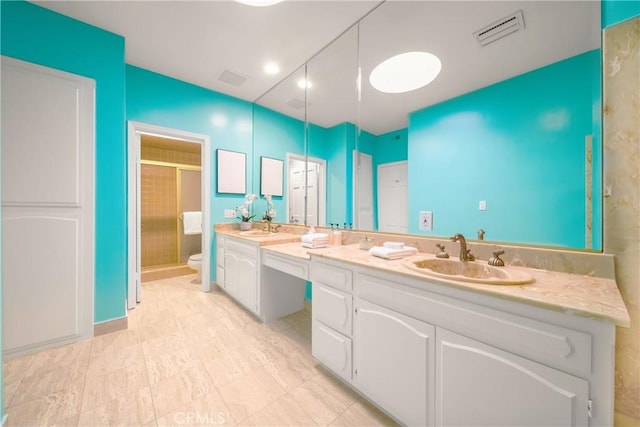 2008 S Bentley Ave Unit 5, Los Angeles, CA 90025 - bathroom featuring a stall shower and double vanity